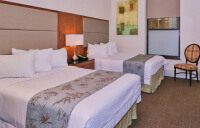 Americana Inn | Deluxe ADA Room with Two Full Beds and a Private Bath